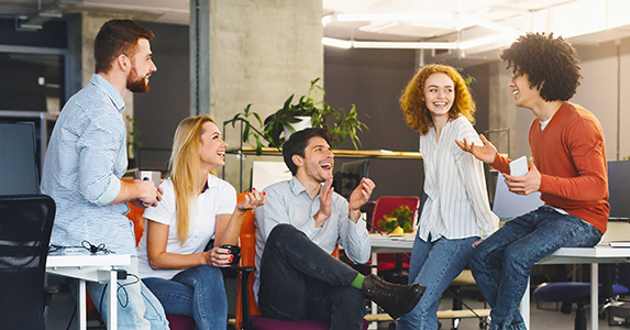 happy employees who are part of a connected culture