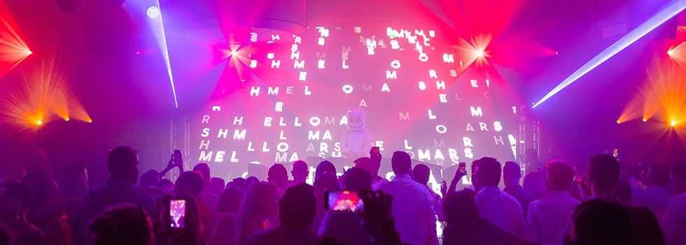 event attendees dancing to Marshmellow at novelty event experience