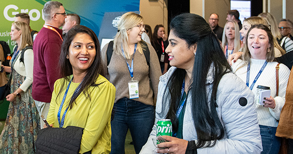 event attendees networking at corporate meeting