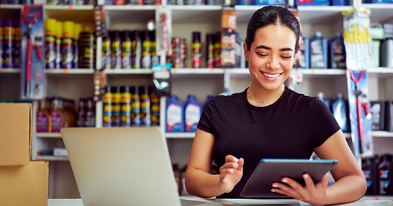 automotive store channel partner engaging in incentive program on tablet