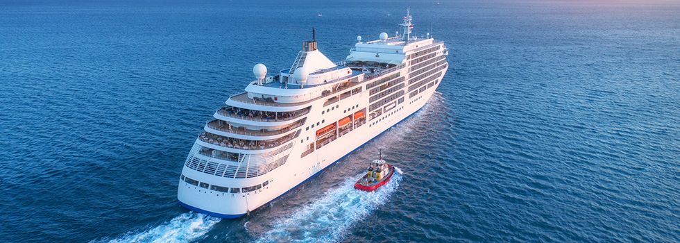 cruise ship embarking on ocean voyage