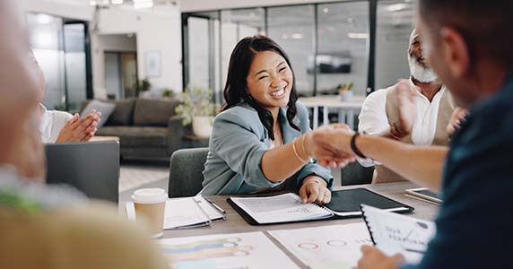 team members celebrating employee anniversary