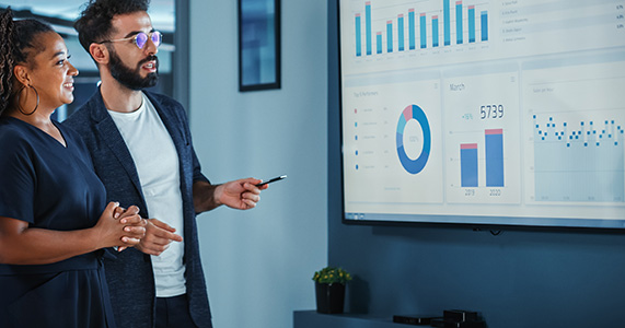 sales team reviewing incentive program data