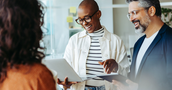 group of coworkers reviewing data for loyalty program