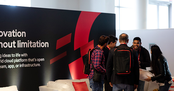 attendee interacting with mural wall at strategic event
