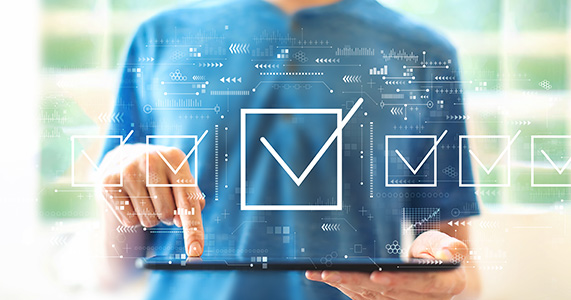 business person checking boxes from a list