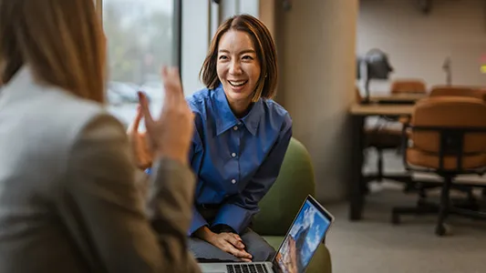 Manager having a meeting with introverted employee about how to support her