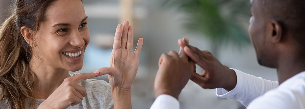 travel attendee communicating with interpreter during activity